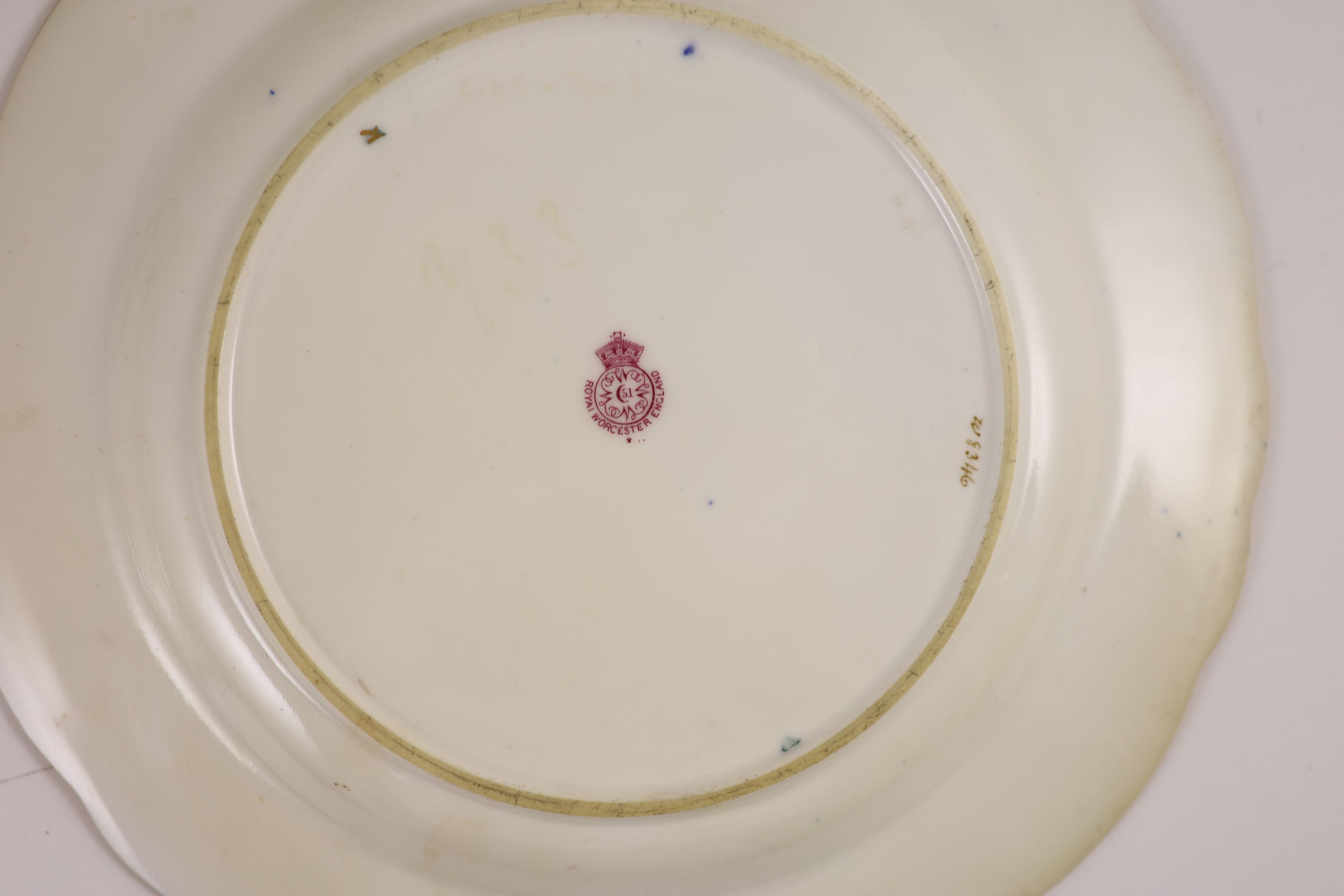 Three Royal Worcester fruit painted dessert plates, signed E. Phillips, c.1918, 22.5cm diameter